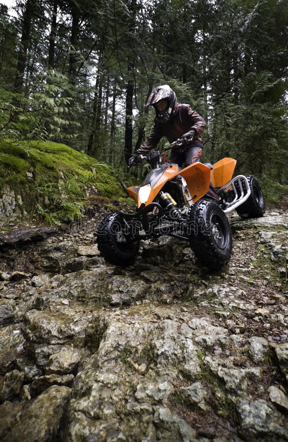 Riding-ATV-in-mountains-stock-image_-Image-of-male-maneuver-13064561.jpg